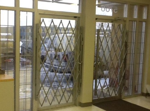 Security gates for commercial doors 